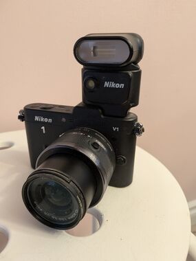 Nikon 1 V1 Mirrorless Camera with External Flash - Black